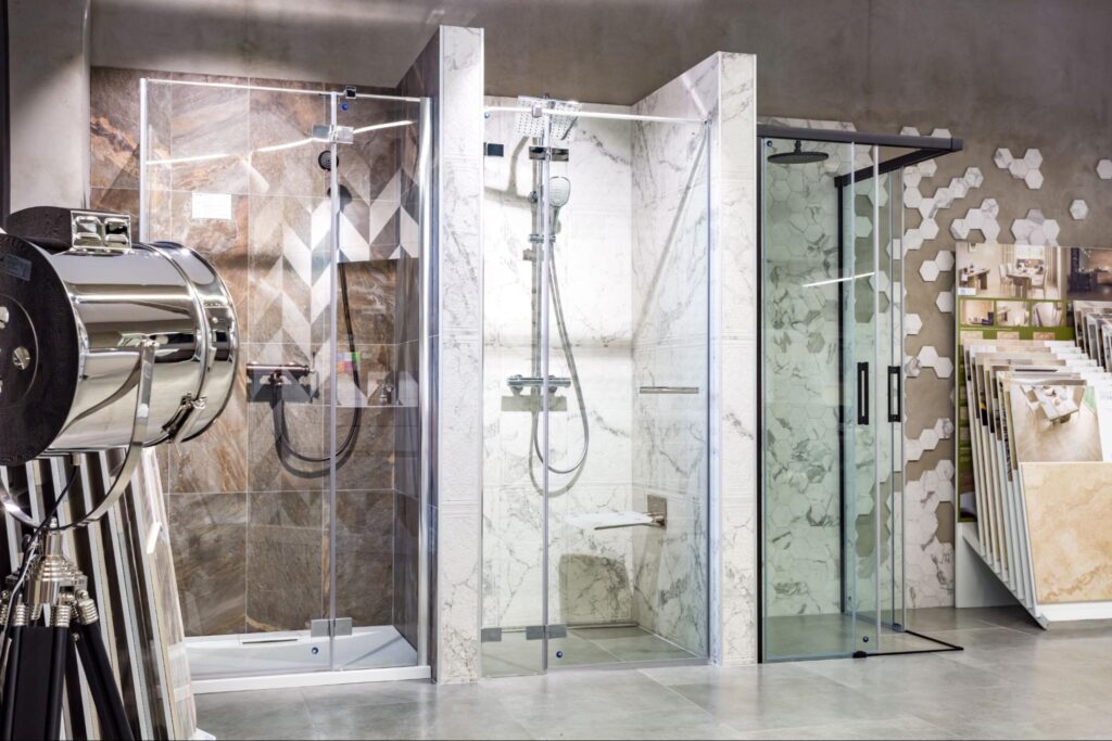 Shower cabins inside the plumbing shop.